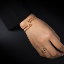 Load image into Gallery viewer, Gold safety pin bangle bracelet and ring.

