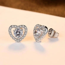 Load image into Gallery viewer, Heart shaped sterling silver stud earrings with cz stones.

